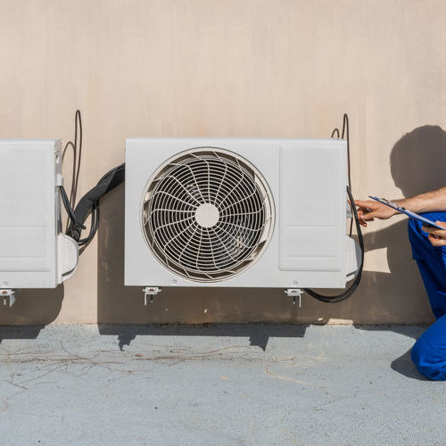 Man Doing Heating, Ventilation, And Air Conditioning Inspection